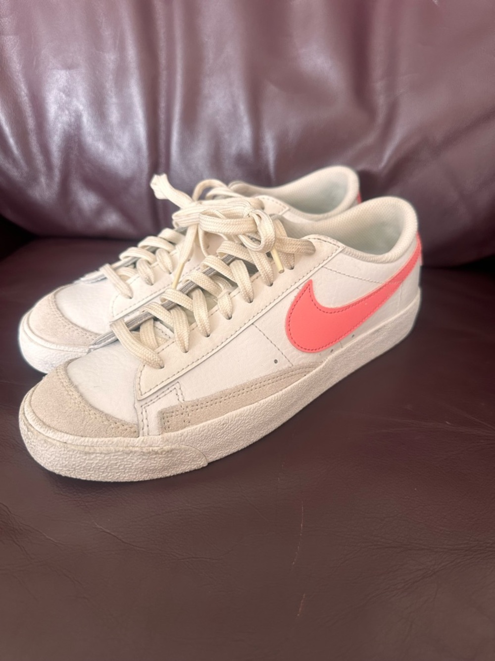 Nike Women’s Low-Top Sneakers in Off-White with Coral Swoosh